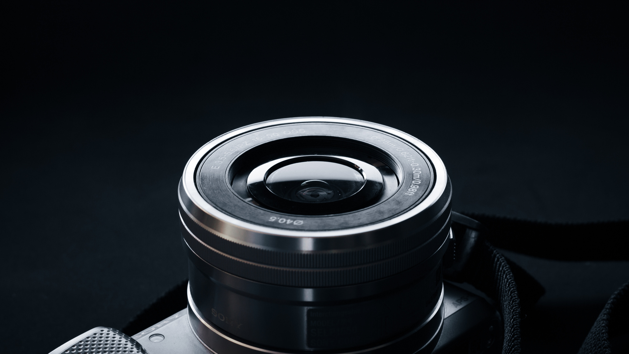 Black Camera Lens on a Black Background